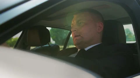 Furious angry  man standing in a traffic jam beeps and hurries.  Stock Footage 201086211