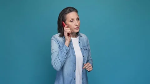 Furious lady call smart device scream isolated blue color background Stock Footage 167321518