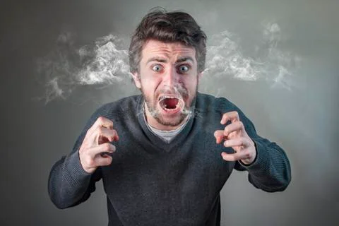 Furious man steaming with rage Stock Photos