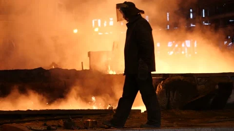 The furnace operator monitors the operation of the blast furnace. Stock Footage 139736482