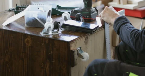 Furniture assembling, drawing marks, close up Stock Footage 145789453