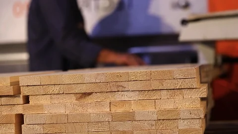 Furniture board close-up, worker in the background. Flat wooden sheet, Torces Stock Footage 108722185