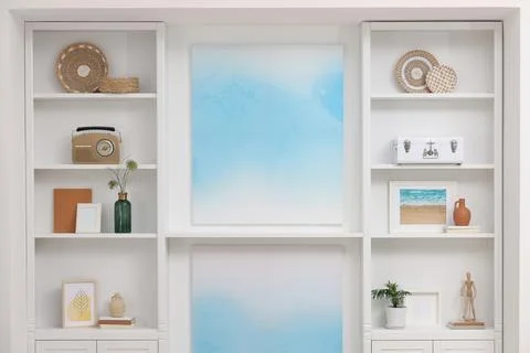 Furniture with different decor elements in room. Interior design Stock Photos