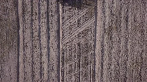 Furrows row pattern in a plowed field prepared for planting crops. Stock Footage 134498703