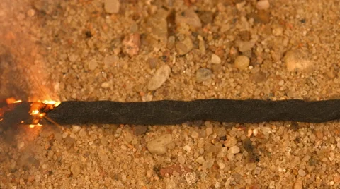 Fuse burning on the ground .  Blasting 4K video Stock Footage 49807688