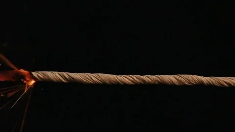 Fuse lights up on a black background. Bomb Stock Footage 79306976