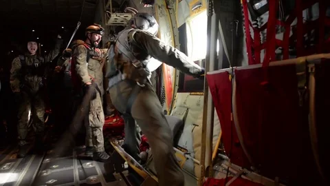 Fuselage side Door being opened C-130 Hercules during Operation Atlantic Resolve Stock Footage 81956922