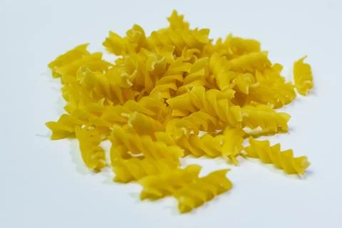 Fusilli dry pasta isolated on white close up Stock Photos