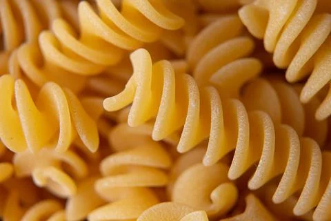 Fusilli pasta background Stock Photos