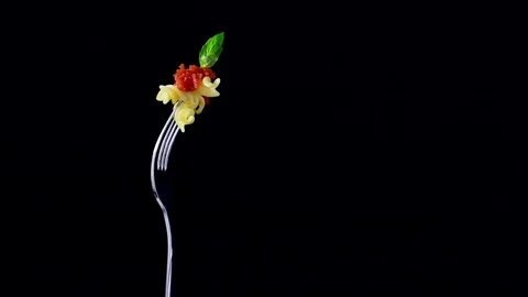 Fusilli, pasta on black background Stock Footage 80428395