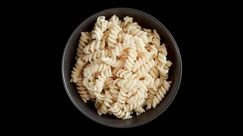 Fusilli pasta cooked in bowl 스톡 동영상 221983358