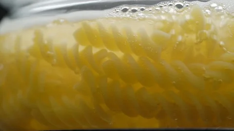 Fusilli pasta cooking boiling in water Stock Footage 108113819