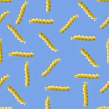 Fusilli pasta random flat lay on blue background without shadow. can be used  Stock Photos