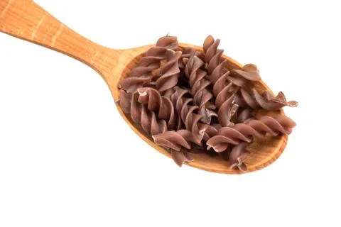 Fusilli pasta in spoon Stock Photos