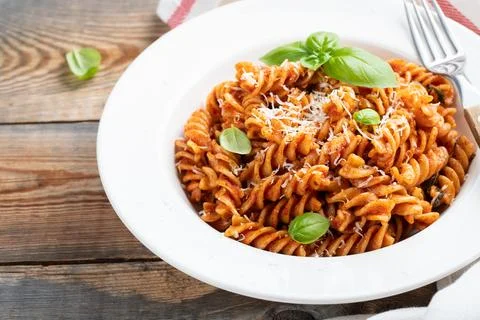 Fusilli pasta with tomato sauce. Stock Photos