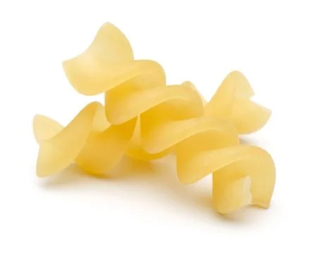 Fusilli pasta on white background Stock Photos