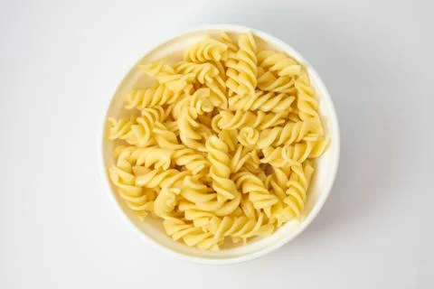 Fusilli into the pot Stock Photos