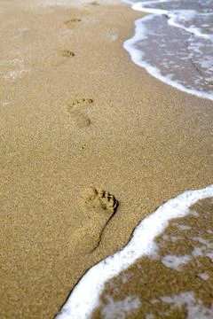 Fußabdruck im Sand Fußspuren im Sand am Meer Copyright: xZoonar.com/Christ. Stock Photos