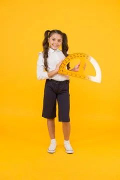 Future architect. Engineering course. Geometry concept. Schoolgirl holding 스톡 사진