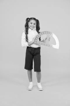 Future architect. Engineering course. Geometry concept. Schoolgirl holding 스톡 사진