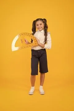 Future architect. Engineering course. Geometry concept. Schoolgirl holding 스톡 사진
