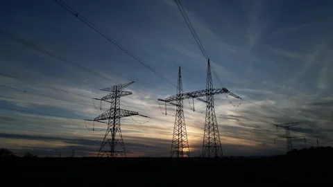 Future Energy Grid Power Lines at Sunset AI Electricity Network Video stock 333594274