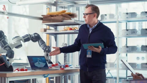 Future Engineers And Scientist Work On Robot Arm Prototype Stock Footage 187566702