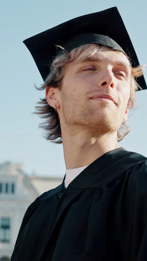 Future, graduation and vision with man outdoor for ceremony at college or Stock Footage 338092897