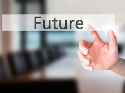 Future - Hand pressing a button on blurred background concept on visual scree Stockfoto's