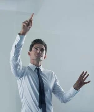 Future, interface and business man user in studio on gray background for Stock Photos