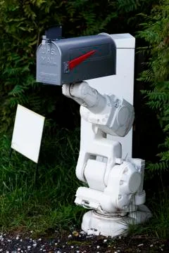 The future mailbox with robotic arm, something for the postman to fear Stock Photos