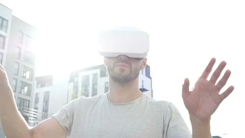 Future is now. Handsome man playing game in vr glasses. Stock Footage 94060718