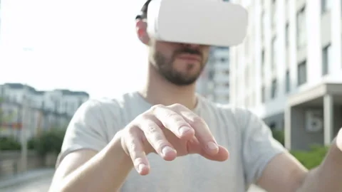 Future is now. Handsome man working at virtual office in vr glasses Stock Footage 94060411
