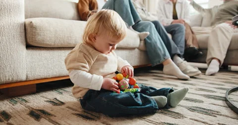 Future, problem solving and toy with baby boy in home living room for motor Stock Footage 341405914
