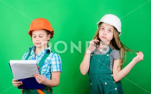 Future profession. Kids girls planning renovation. Initiative children girls Stock Photos