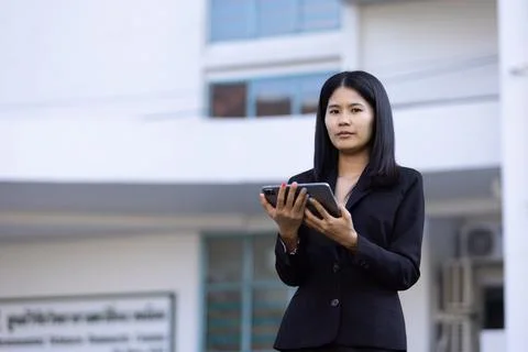 Future remote work combines technology smart phone digital business woman e.. Stock Photos