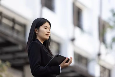 Future remote work combines technology smart phone digital business woman e.. Stock Photos