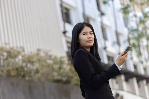 Future remote work combines technology smart phone digital business woman e.. Stock Photos