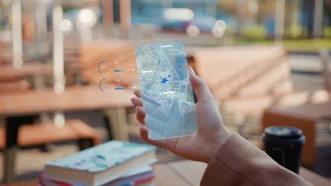 Future Smartphone. The Man use Smartphone with Futuristic Design on the Stock Footage 125093177