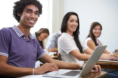 Future software developers...Portrait of a group of smiling university students Stock Photos