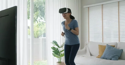 Future of sports exercise online class gym at home with VR experience. 動画素材 163858863