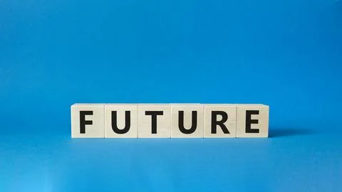 Future symbol. Concept word Future on wooden cubes. Beautiful blue background Stock Photos