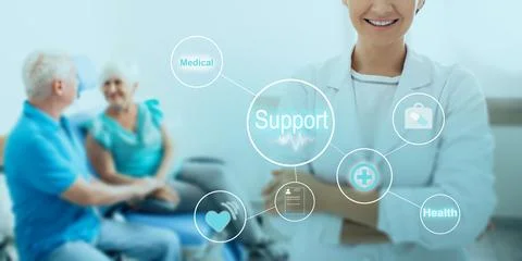 Future technologies of medical support elderly patients . Doctor standing nea 库存照片