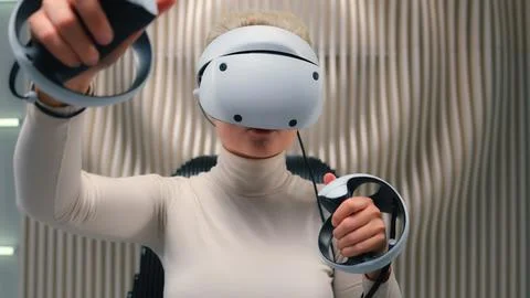 Future technology exploring 3d cyber simulation Caucasian woman girl gamer in VR Stock Photos