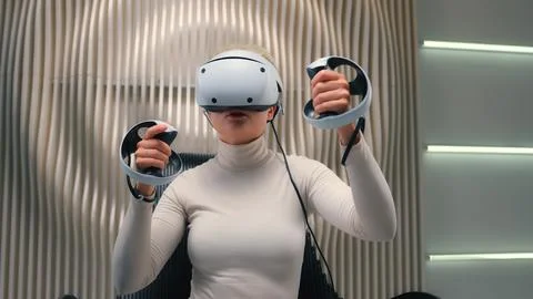 Future technology exploring 3d cyber simulation Caucasian woman girl gamer in VR Stock Photos
