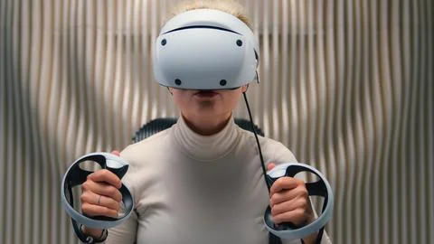 Future technology exploring 3d cyber simulation Caucasian woman girl gamer in VR Stock Photos