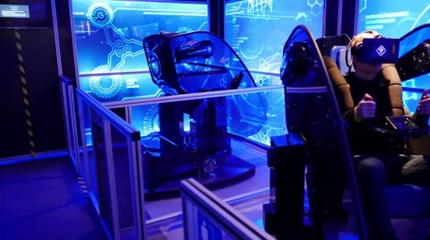 Future technology: Man playing in vr 5d game simulator, virtual reality Stock Footage 62634685