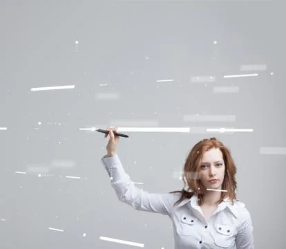 Future technology. Touch button interface. Woman working with futuristic Stock Photos