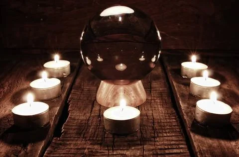 Future teller candle divination various vintage elements on old worn backg... Stock-Fotos