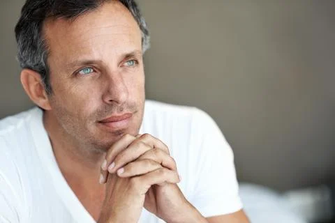 Future, thinking and vision with man in home for brainstorming, relax and r.. Stock Photos